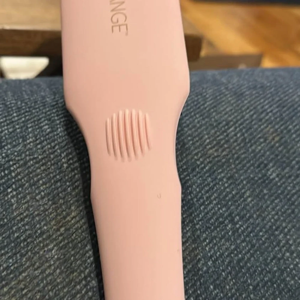 Lange brush hair straightener